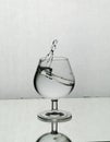 Splash of water in a wine glass