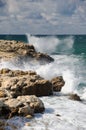 Splash of waves about coastal stones Royalty Free Stock Photo