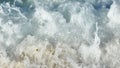 Splash of waves on the sandy beach. foam, surf, waves