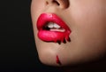 Splash. Woman's Red Lips with Dripping Lipstick. Creativity Royalty Free Stock Photo