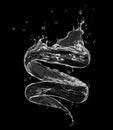 Splashes of fresh water in a swirling shape on black background Royalty Free Stock Photo