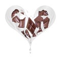 Splashes of milk in the shape of a heart with chocolate