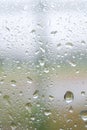Splashes of rain on a window pane