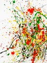 Splashes on red and black and green and yellow paint. vertical