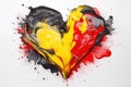 splashes streaks of paint in a shape heart in colors of German flag