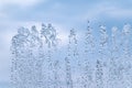 Splashes of water against the blue sky background Royalty Free Stock Photo