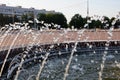 Splashes of water in the fountain at sunset Royalty Free Stock Photo