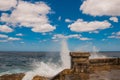 Splashes of waves. View from the waterfront Malecon on the water. Cuba. Havana. Royalty Free Stock Photo