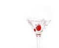 Splashing Cherry in Martini Glass Royalty Free Stock Photo