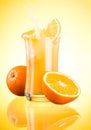 Splashing Fresh Orange Juice on yellow