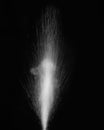 Splashing hot water with steam on a black background. Abstract background, design element Royalty Free Stock Photo