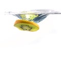 Splashing kiwi fruit on the water Royalty Free Stock Photo