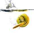 Splashing kiwi fruit on the water Royalty Free Stock Photo