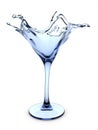 Splashing martini cocktail glass