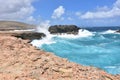 Splashing Ocean Waves with Rocks Near Andicuri Beach Royalty Free Stock Photo