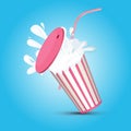 Splashing pink stripped milkshake paper cup with pipe and cover Royalty Free Stock Photo