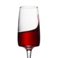 Splashing red wine in an elegant glass Royalty Free Stock Photo