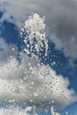 Splashing water and drops from spring fontain Royalty Free Stock Photo