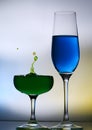 Splashing water drop on wine glass Royalty Free Stock Photo
