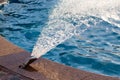 Splashing water in the pool as a background Royalty Free Stock Photo