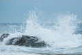 Splashing wave in the sea rocks