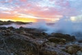 Splashing Waves on Sunset at O`Sullivan Beach, South Australia