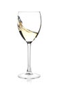 Splashing white wine in a glass Royalty Free Stock Photo