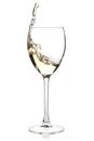 Splashing white wine in a glass Royalty Free Stock Photo