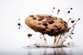 Splasing choclate on a cookie on white background Royalty Free Stock Photo