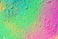 A splatter of pastel natural colored pigment powder on black background Royalty Free Stock Photo