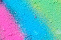 A splatter of pastel natural colored pigment powder on black background Royalty Free Stock Photo