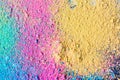 A splatter of pastel natural colored pigment powder on black background Royalty Free Stock Photo