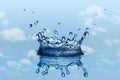 Splatter and splash in crown shape with small drops of water Royalty Free Stock Photo