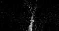 Splattering Water on a Black Background. Royalty Free Stock Photo