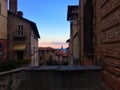 Splendid ancient balcony in Saluzzo town, Piedmont region, Italy. History, sunset, enchanting architecture and art