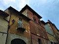 Splendid ancient houses in Saluzzo town, Piedmont region, Italy. History, colours, enchanting architecture and art