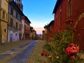 Splendid ancient street in Saluzzo town, Piedmont region, Italy. History, sunset, enchanting architecture and art
