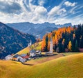 Splendid autumn view of San Genesio and Santa Barbara churches.