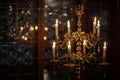 Splendid chandelier with lit candles in a beautiful room