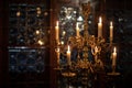 Splendid chandelier with lit candles