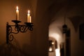 Splendid chandelier with lit candles in a beautiful room Royalty Free Stock Photo