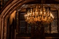 Splendid chandelier with lit candles in a beautiful room Royalty Free Stock Photo