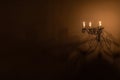 Splendid chandelier with lit candles in a beautiful room Royalty Free Stock Photo