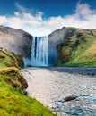 Splendid summer view of huge Skogafoss Waterfall on Skoga river. Colorful summer scene in south Iceland, Europe.