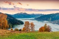 Splendid view of Zell lake. Impressive autumn sunrise of Austrian town - Zell am See, south of the city of Salzburg. Beauty of