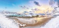 Splendid winter scenery with Haukland beach during sunset and snowy mountain peaks near Leknes