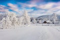 Splendid winter sunrise in the Carpathian village.