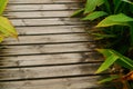 Spliced wooden planks are laid on the ground as architectural decorations in tourist attractions