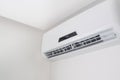 Split air conditioner closeup on white wall in flat indoors Royalty Free Stock Photo