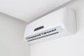 Split air conditioner closeup on white wall in flat indoors Royalty Free Stock Photo